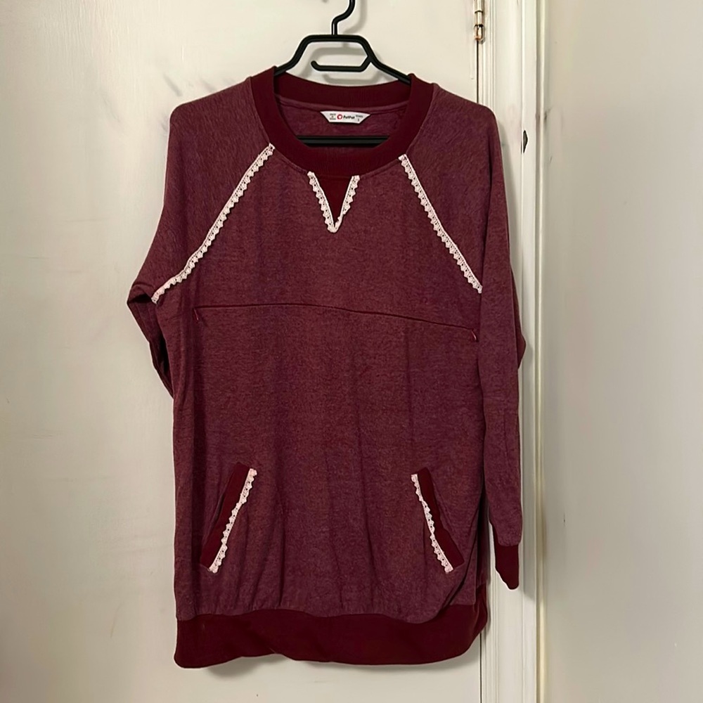 Maternity/nursing long sleeve top with zipper opening.